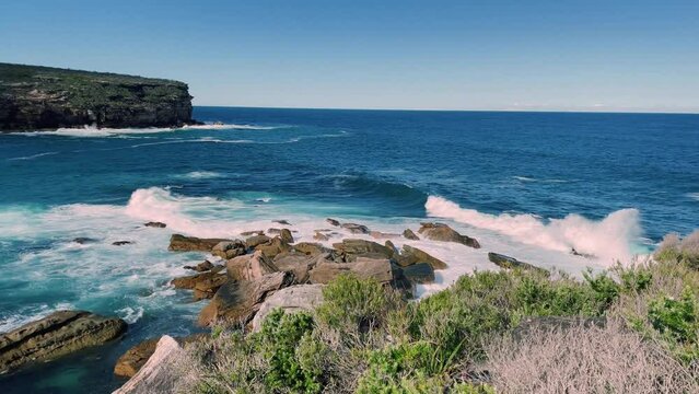 4k Video -Beautiful view from above at Wattamolla, from the coastal walking trail to Providential Point lookout in Royal National Park, located South of Sydney, NSW, Australia.