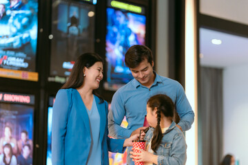 Families are using movie tickets to check and chat before going in.