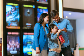 Families are using movie tickets to check and chat before going in.