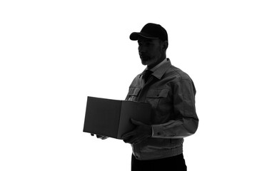 箱を持つ作業服を着た外国人男性のシルエット