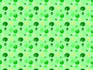 leaf and small flowers on green background.