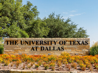 Sunny view of the sign of The University of Texas at Dallas
