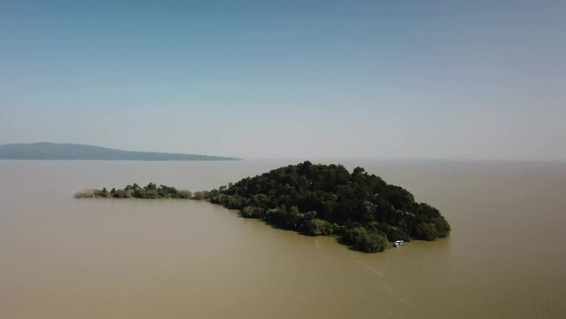 Island of Kebran Gabriel monastery on Lake Tana in Ethiopia. Aerial view from a drone.