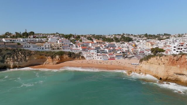 Drone panoramic establishing view of carvoeiro village algarve portugal