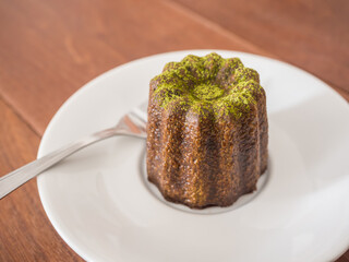 japanese green tea french dessert in a round dish