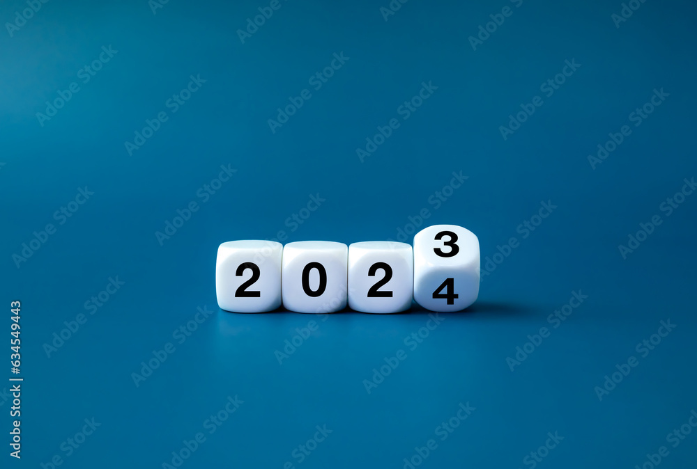 Poster 2024 happy new year with change to new era concepts. Flipping the 2023 to 2024 year calendar numbers on white dice, cube blocks isolated on dark blue banner background, minimalist simple style.