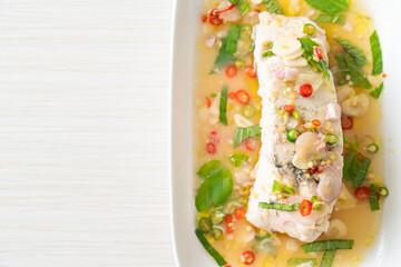 steamed sea bass fish with herbs
