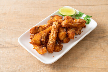 Fried Snapper Belly on white plate