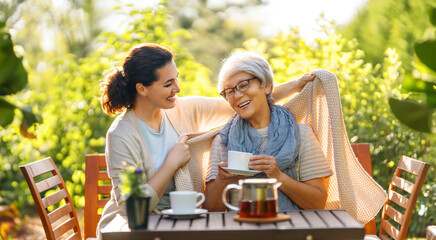 women drinking tea in the garden