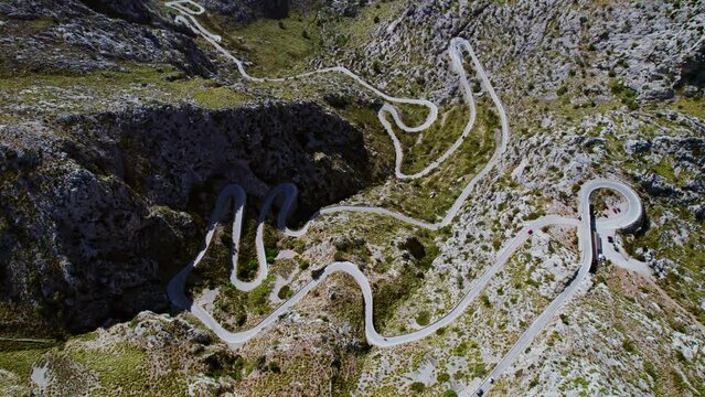 Aerial Drone View Of Coll dels Reis Mountain Pass With The Serpentine Road Of Nus de sa Corbata In Mallorca, Spain.
