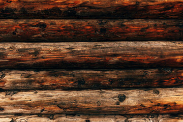 Wooden bungalow log cabin facade detail, texture of brown pine wood