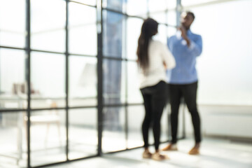 Fototapeta premium Blurred image of business people standing in the office