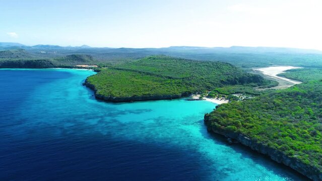 Panoramic wide angle aerial view of stunning blue ocean water on curacao coastline