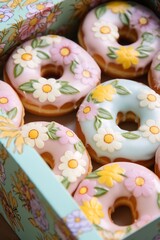 Fototapeta na wymiar A colorful array of pastel donuts sprinkled with sweetness and glaze, arranged among a bed of beautiful flowers, creates a delightful indoor snack that is sure to satisfy any craving for confectioner
