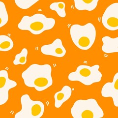 seamless pattern fried eggs with orange color background
