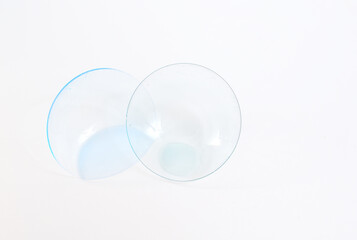 Contact lenses, or simply contacts on white background