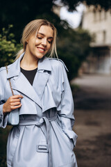 Fototapeta premium Portrait of beautiful woman walking in park