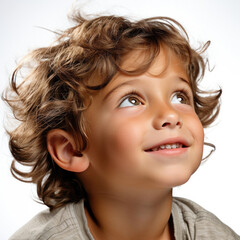 Naklejka premium A professional studio headshot capturing the whimsical daydreams of a 5-year-old Lebanese boy.