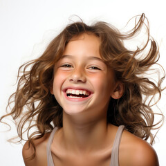 A professional studio head shot capturing the pure joy of an 11-year-old Uruguayan girl as she laughs heartily.