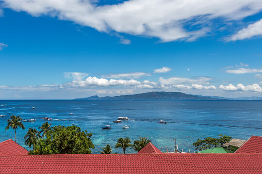 Rooftop view of boats in anchored in ocean, Haligi Beach, Puerto Galera, Mindoro, Philippines