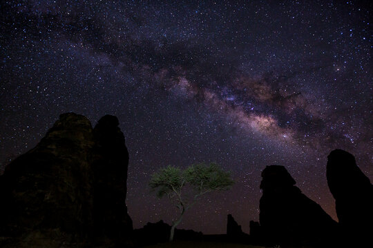 Milky way over Al-Ula rock formation in desert, Saudi Arabia