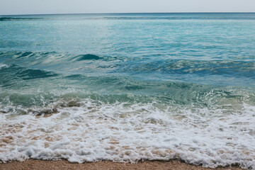 View of the beautiful blue waves of the ocean