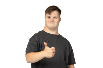 PNG,smiling young man with down syndrome in black t-shirt showing thumbs up,isolated on white...