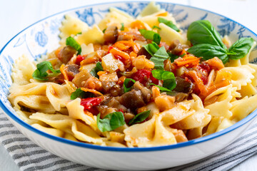 Italian pasta with vegetables close up.