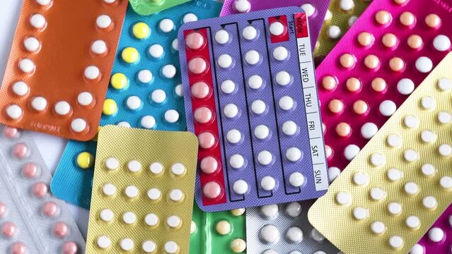 Colorful strips of oral contraceptive pill.