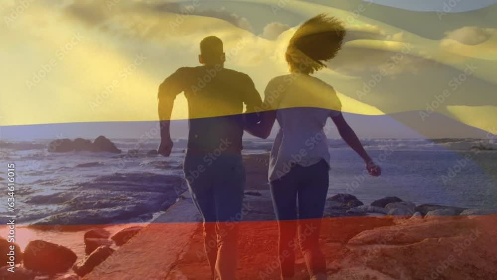 Poster Animation of waving colombia flag over biracial couple running together on the promenade