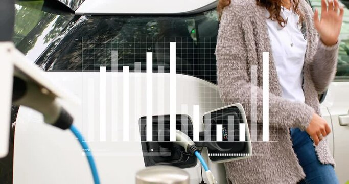Animation of statistical data processing over mid section of woman waiting while her car is charging