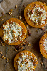 Baked butternut squash with goat feta cheese and pumpkin seeds