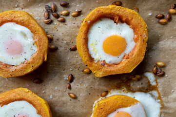 Zero waste meal with stuffed butternut squash, fried eggs and seeds