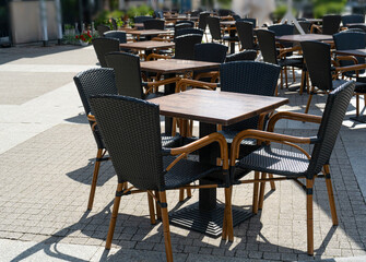 Fototapeta na wymiar Street Restaurant Table, Empty Cafe Tables, Bar Terrace, Outdoor Restaurants, Outside Trattoria