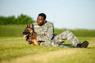 Military working dog and soldier loyal to each other.
