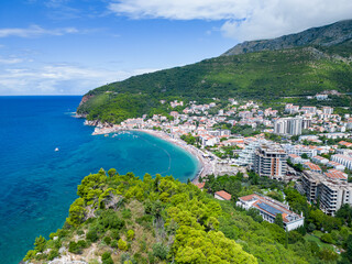 Petrovac na Moru Aerial View.  Beaches and coastline of the Adriatic Sea at summer time.  Natural landscapes of Montenegro. Balkans. Europe. 