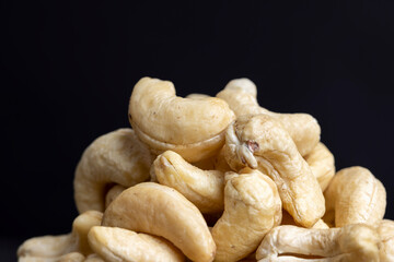 Fresh peeled cashew nuts on the table