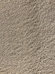 Textured Stone Pavement Surface with Gravel and Brick Pattern