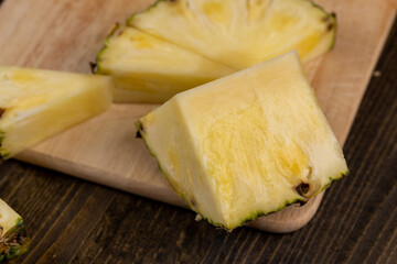 sliced ripe yellow pineapple, a large number of pieces