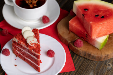 Red cake with cream and raspberry flavor