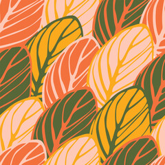 Fototapeta na wymiar Colorful leaves create a seamless pattern for contemporary textiles. Vector.