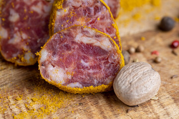 Sliced beef salami with spices and lots of turmeric