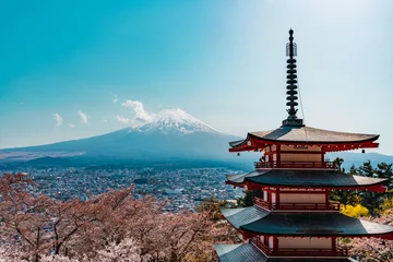 Fototapete Fuji A view of Mount Fuji in Japan with a traditional red Pagoda. Cherry blossom.