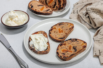 Sweet bread with raisins, dried apricots, dates, figs. Healthy ingredient for sandwiches, breakfast
