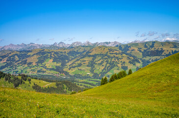 Swiss alps landscape from Rinderberg top gondola station. Gstaad, Switzerland.