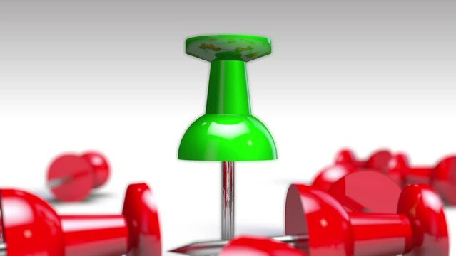 Green Push pin standing out from the crowd
