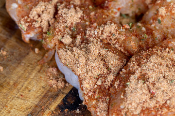 chicken fillets marinated in spices close-up