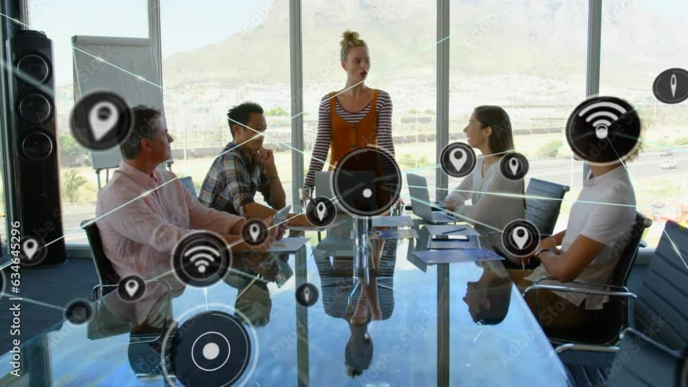 Poster animation of network of icons over team of diverse colleagues discussing together at office