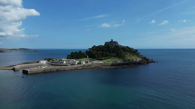 4K: Aerial Drone Video of St. Michael's Mount in Cornwall, England, UK. Flying around the harbour. Stock Video Clip Footage