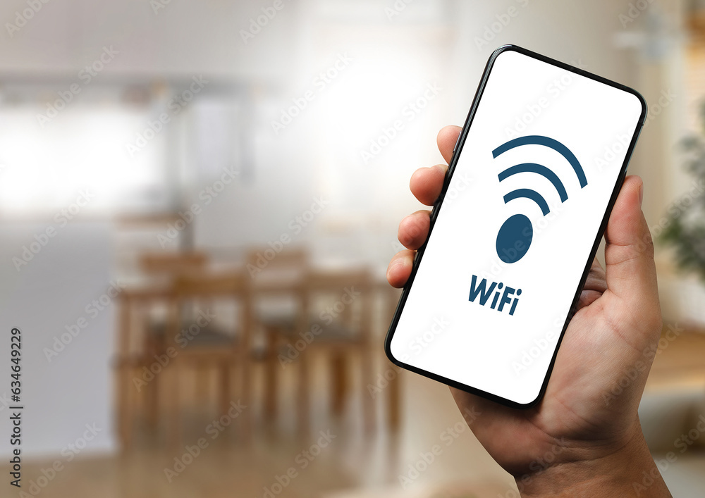 Poster close-up man using smartphone with wifi icon communication social network button to connect to wirel